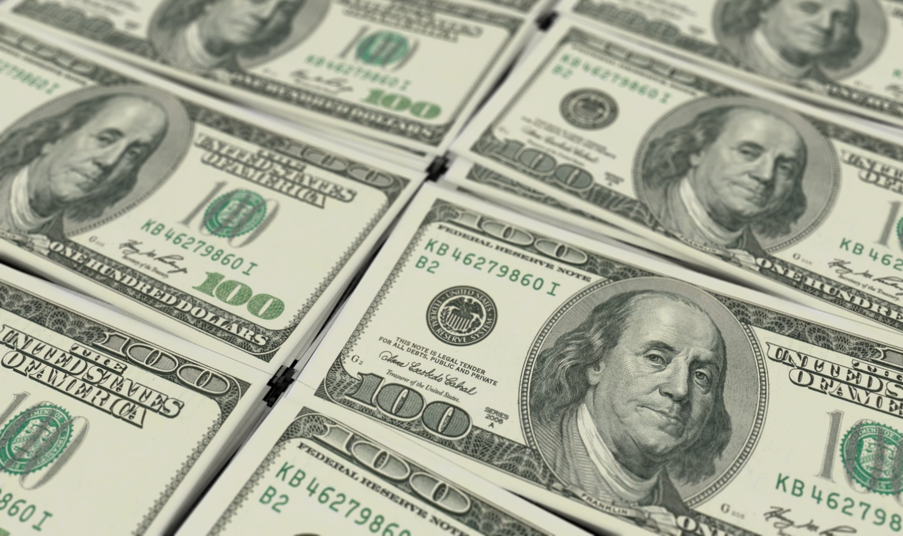 Stacks of hundred dollar bills